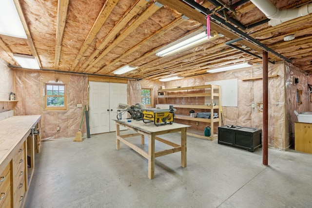 7 Coven Hill Ln, South Bristol, ME 04568 - below grade area with a workshop area and healthy amount of natural light