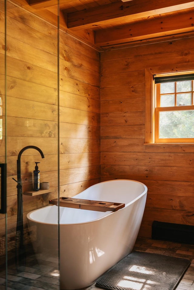 7 Coven Hill Ln, South Bristol, ME 04568 - full bath featuring a freestanding bath, wood walls, and beam ceiling