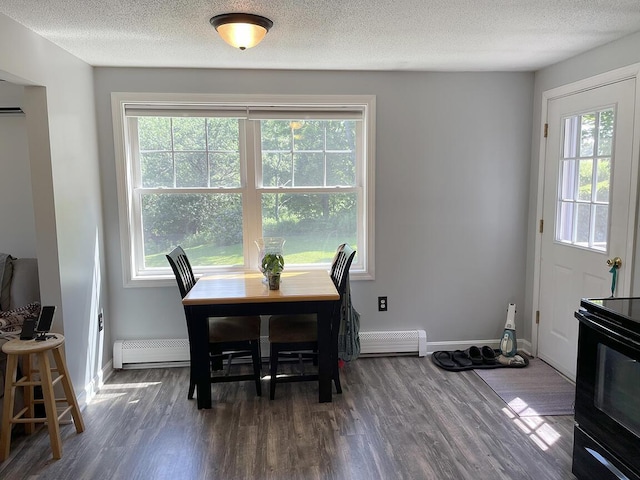 232 Hatch Rd, Prospect, ME 04981 - dining area with dark wood-style floors and a textured ceiling