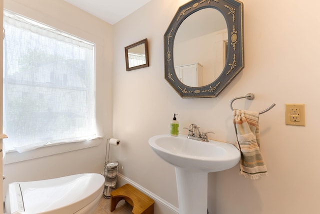 390 Front St, Bath, ME 04530 - bathroom featuring a sink and baseboards