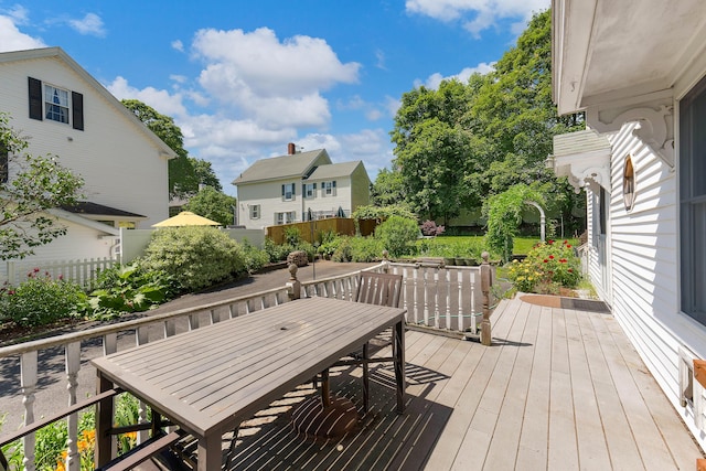 390 Front St, Bath, ME 04530 - wooden deck with outdoor dining area and a fenced backyard