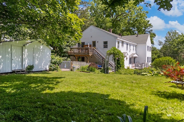 390 Front St, Bath, ME 04530 - view of green lawn featuring a storage shed, a deck, and stairs