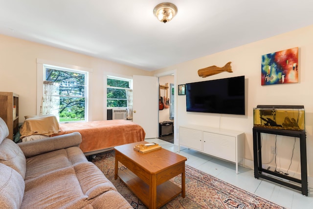 390 Front St, Bath, ME 04530 - living area featuring cooling unit and light tile patterned floors