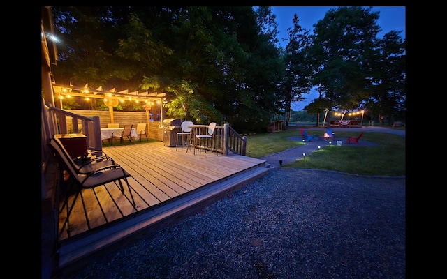 1093 N Chester Rd, Chester, ME 04457 - wooden deck with a lawn