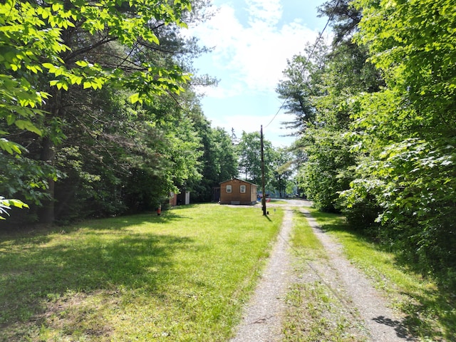 1093 N Chester Rd, Chester, ME 04457 - view of grassy yard with dirt driveway