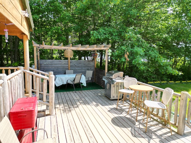 1093 N Chester Rd, Chester, ME 04457 - deck with a grill and outdoor dining space