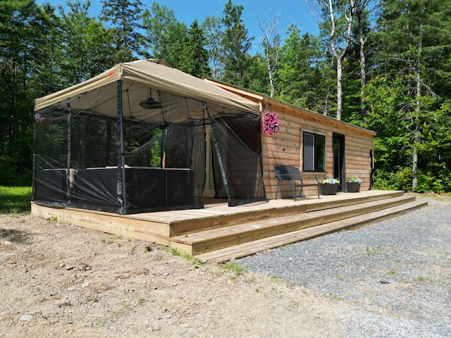 1093 N Chester Rd, Chester, ME 04457 - view of front of house with a deck