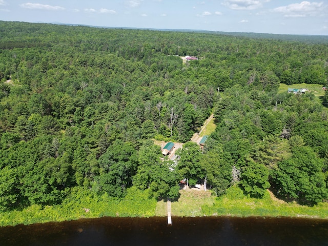 1093 N Chester Rd, Chester, ME 04457 - aerial overview of property's location featuring a heavily wooded area and a nearby body of water