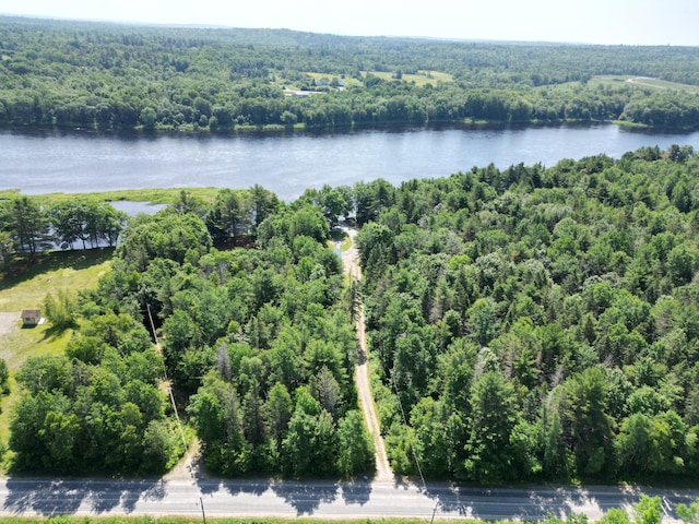 1093 N Chester Rd, Chester, ME 04457 - drone / aerial view of a heavily wooded area and a nearby body of water