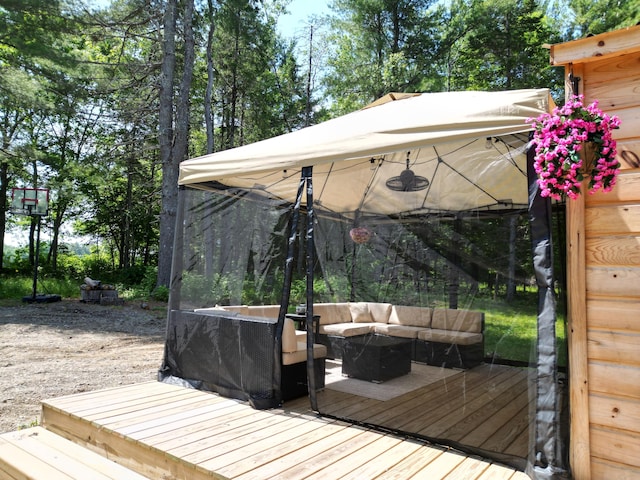 1093 N Chester Rd, Chester, ME 04457 - wooden deck with an outdoor living space and a gazebo
