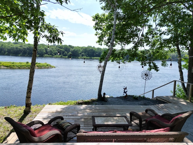 1093 N Chester Rd, Chester, ME 04457 - wooden deck with a water view