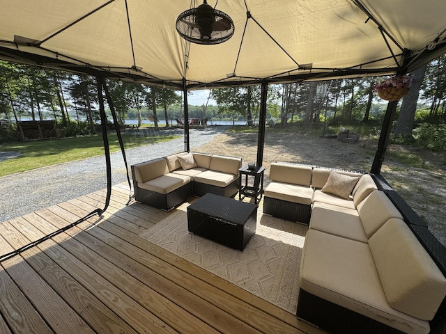 1093 N Chester Rd, Chester, ME 04457 - wooden deck featuring outdoor lounge area and a water view