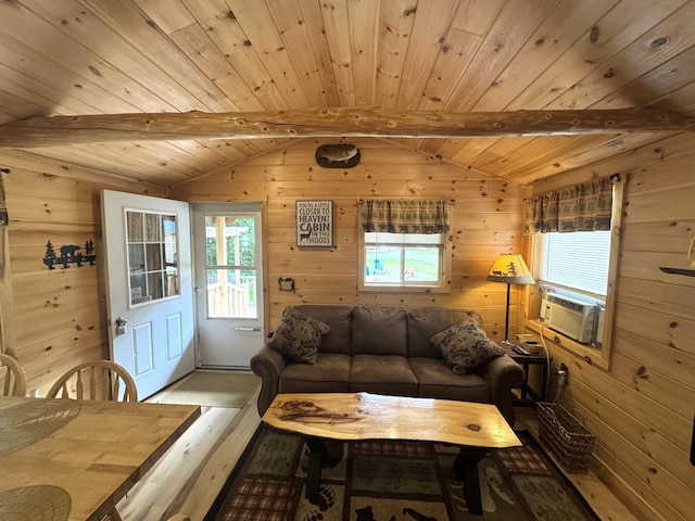 1093 N Chester Rd, Chester, ME 04457 - living area featuring healthy amount of natural light, wood walls, cooling unit, wooden ceiling, and wood finished floors