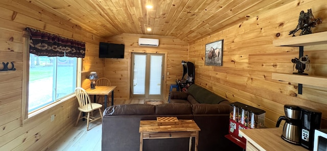 1093 N Chester Rd, Chester, ME 04457 - living room with lofted ceiling, wood walls, an AC wall unit, wood finished floors, and wood ceiling