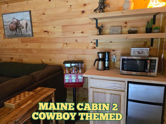 1093 N Chester Rd, Chester, ME 04457 - bar with appliances with stainless steel finishes and wood walls