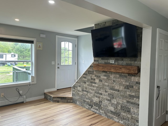64 Litchfield Rd, Bowdoin, ME 04287 - foyer featuring baseboard heating, wood finished floors, and recessed lighting