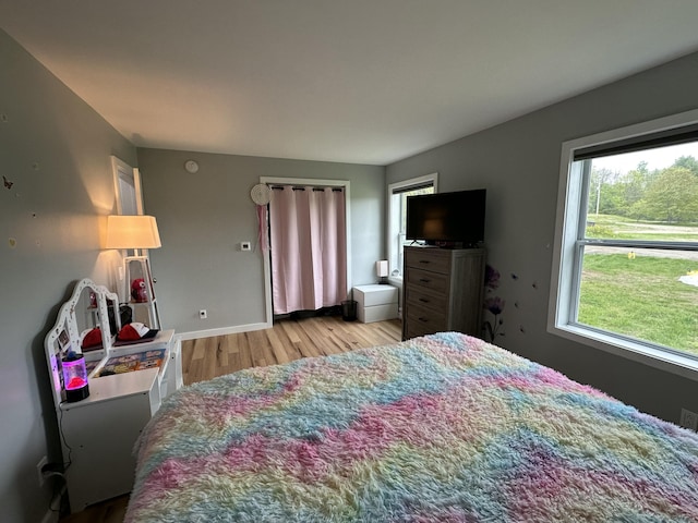 64 Litchfield Rd, Bowdoin, ME 04287 - bedroom with light wood-style flooring and baseboards