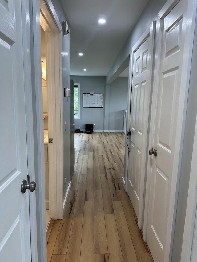 64 Litchfield Rd, Bowdoin, ME 04287 - corridor with light wood-style flooring and recessed lighting
