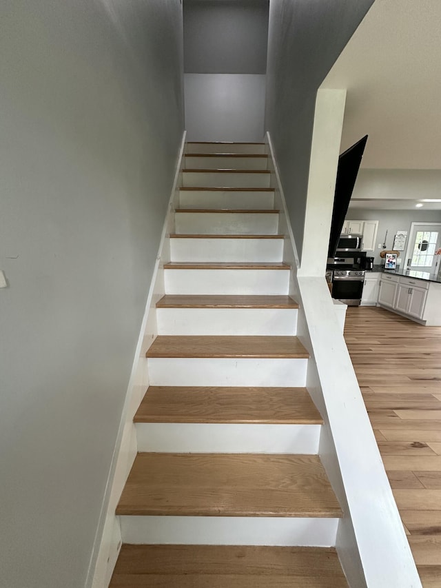 64 Litchfield Rd, Bowdoin, ME 04287 - staircase with wood finished floors