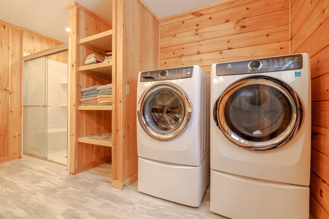 51 Short Point Way, Orland, ME 04472 - laundry area with washer and clothes dryer and wood walls