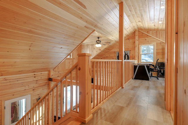 51 Short Point Way, Orland, ME 04472 - hallway with wood walls, wooden ceiling, vaulted ceiling, light wood-type flooring, and a desk