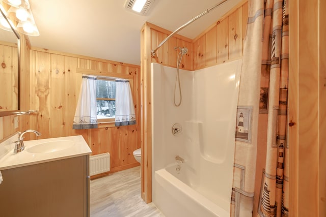 51 Short Point Way, Orland, ME 04472 - full bath with radiator, vanity, shower / bath combination with curtain, and wood walls