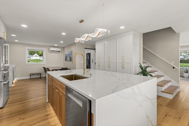 352 River Rd, Eliot, ME 03903 - kitchen with stainless steel appliances, light wood-type flooring, healthy amount of natural light, recessed lighting, and pendant lighting