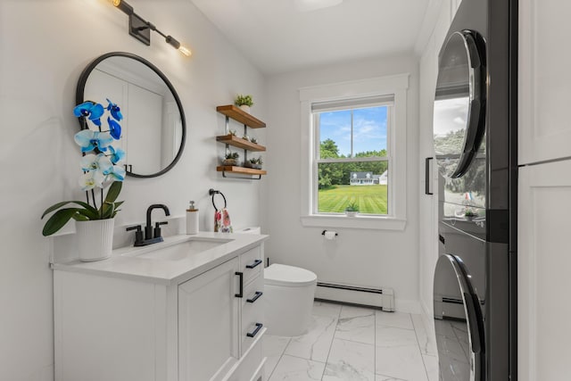 352 River Rd, Eliot, ME 03903 - bathroom featuring baseboard heating, vanity, and marble look tile flooring