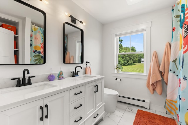 352 River Rd, Eliot, ME 03903 - bathroom with baseboard heating, marble finish floors, and double vanity