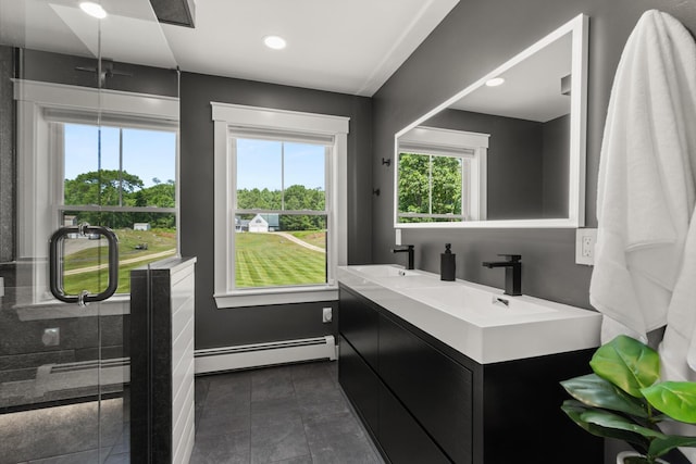 352 River Rd, Eliot, ME 03903 - full bathroom featuring a baseboard heating unit, double vanity, an enclosed shower, recessed lighting, and tile patterned floors