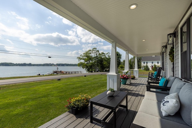352 River Rd, Eliot, ME 03903 - porch with a water view and a lawn