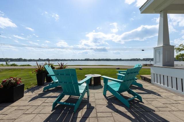 352 River Rd, Eliot, ME 03903 - view of patio / terrace with a water view and a fire pit