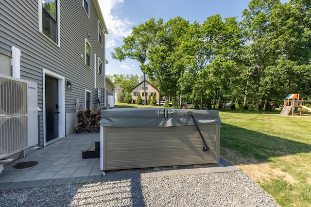 352 River Rd, Eliot, ME 03903 - view of patio with a hot tub and a playground