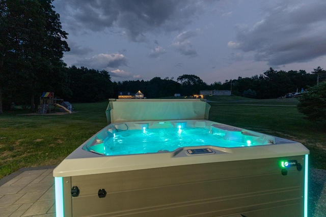 352 River Rd, Eliot, ME 03903 - view of swimming pool with a hot tub, a yard, and a playground