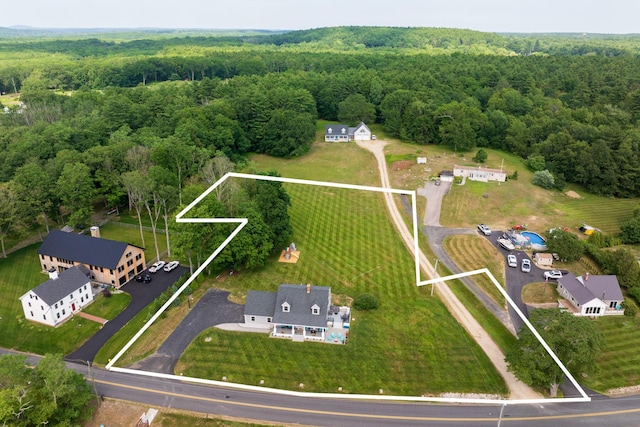 352 River Rd, Eliot, ME 03903 - aerial view of property and surrounding area featuring a forest and property parcel outlined