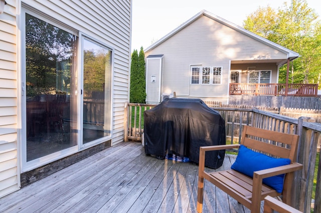 9 St James Pl, Lewiston, ME 04240 - wooden terrace with area for grilling