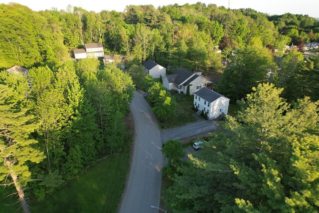 9 St James Pl, Lewiston, ME 04240 - aerial view of property and surrounding area featuring a heavily wooded area
