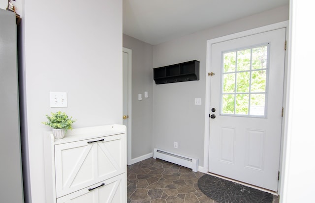 9 St James Pl, Lewiston, ME 04240 - entryway with a baseboard heating unit and baseboards