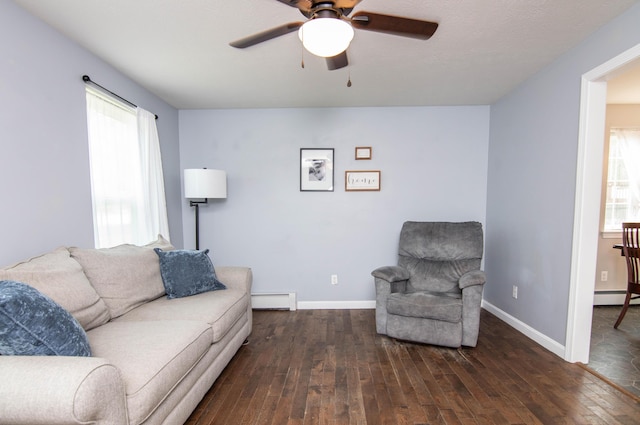 9 St James Pl, Lewiston, ME 04240 - living area with a baseboard heating unit, wood-type flooring, ceiling fan, and baseboard heating