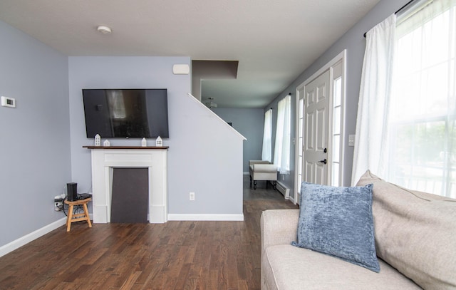 9 St James Pl, Lewiston, ME 04240 - living room featuring wood finished floors and stairway