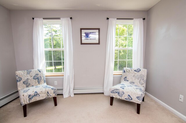 9 St James Pl, Lewiston, ME 04240 - sitting room with carpet and a baseboard radiator