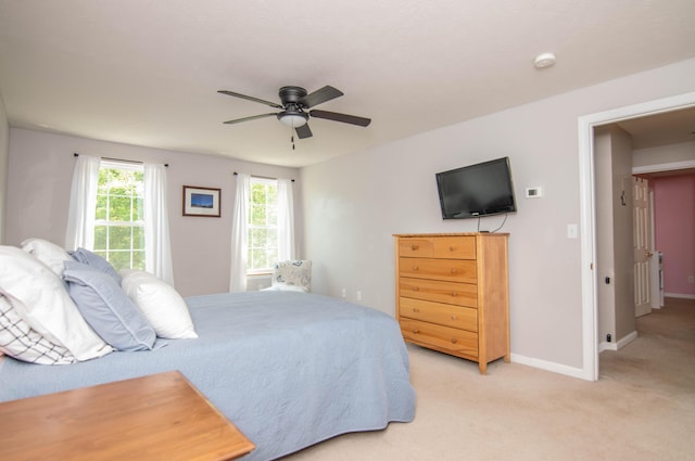 9 St James Pl, Lewiston, ME 04240 - bedroom with light colored carpet and a ceiling fan