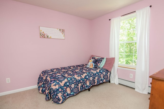 9 St James Pl, Lewiston, ME 04240 - bedroom featuring carpet floors, multiple windows, and a baseboard radiator