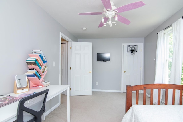 9 St James Pl, Lewiston, ME 04240 - bedroom with light carpet, an office area, and a ceiling fan