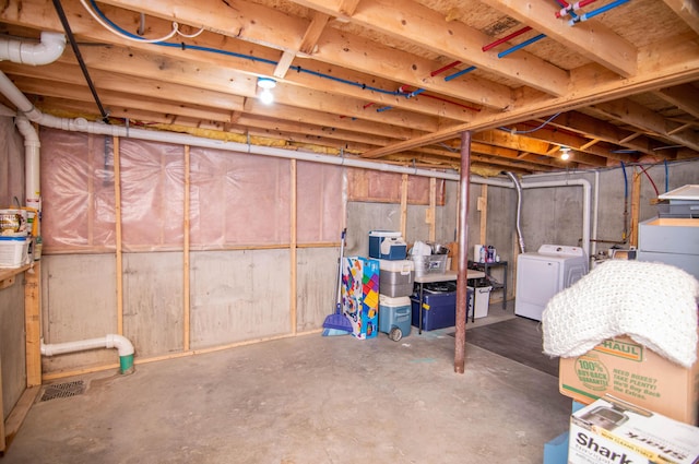 9 St James Pl, Lewiston, ME 04240 - unfinished basement featuring independent washer and dryer