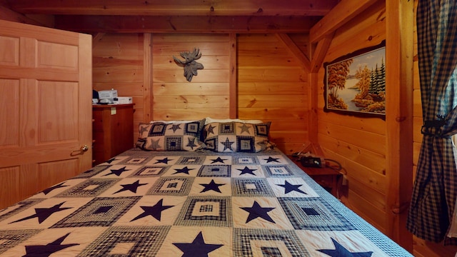 25 Loop Rd, Chester, ME 04457 - bedroom featuring wooden walls and beamed ceiling