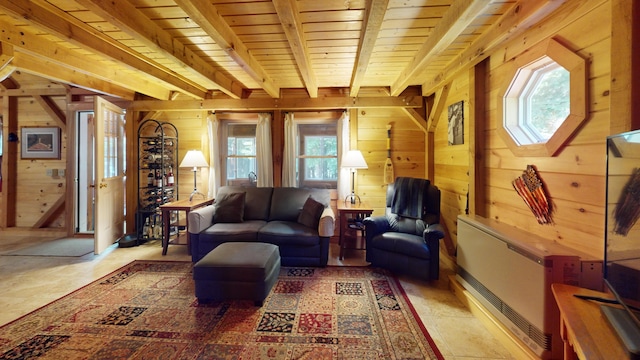 25 Loop Rd, Chester, ME 04457 - living area featuring wood walls and a wooden ceiling with exposed beams