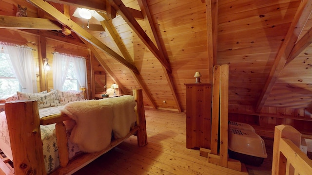 25 Loop Rd, Chester, ME 04457 - bedroom featuring wood ceiling, light wood finished floors, and wood walls