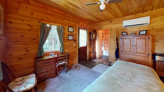 25 Loop Rd, Chester, ME 04457 - bedroom featuring a wall unit AC, wood ceiling, wooden walls, and an office area