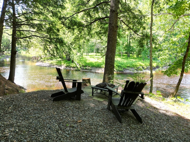 25 Loop Rd, Chester, ME 04457 - view of community with a water view and an outdoor fire pit